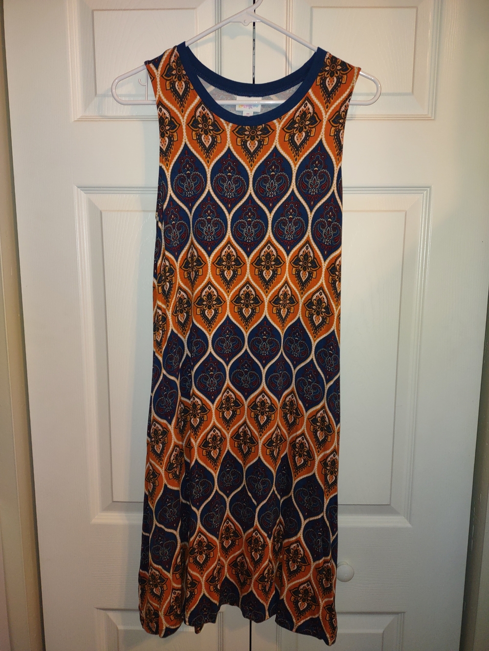 LuLaRoe Sleeveless Midi Dress in Navy and Orange Medallion Print